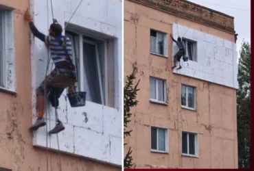 Чоловік з протезом утеплює фасад багатоповерхівки: фото з Василькова вразило мережу
