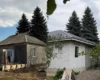 Киянка купила хату в селі за два мільйони гривень для батьків-переселенців (відео)